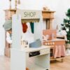 marchande-en-bois-vert-flexa-play